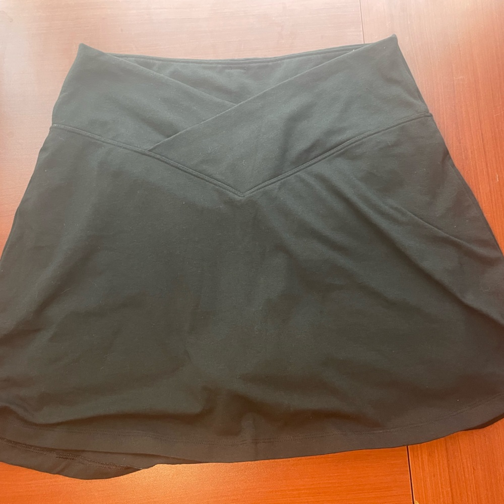 A black cross over tennis skirt from pink size Large
